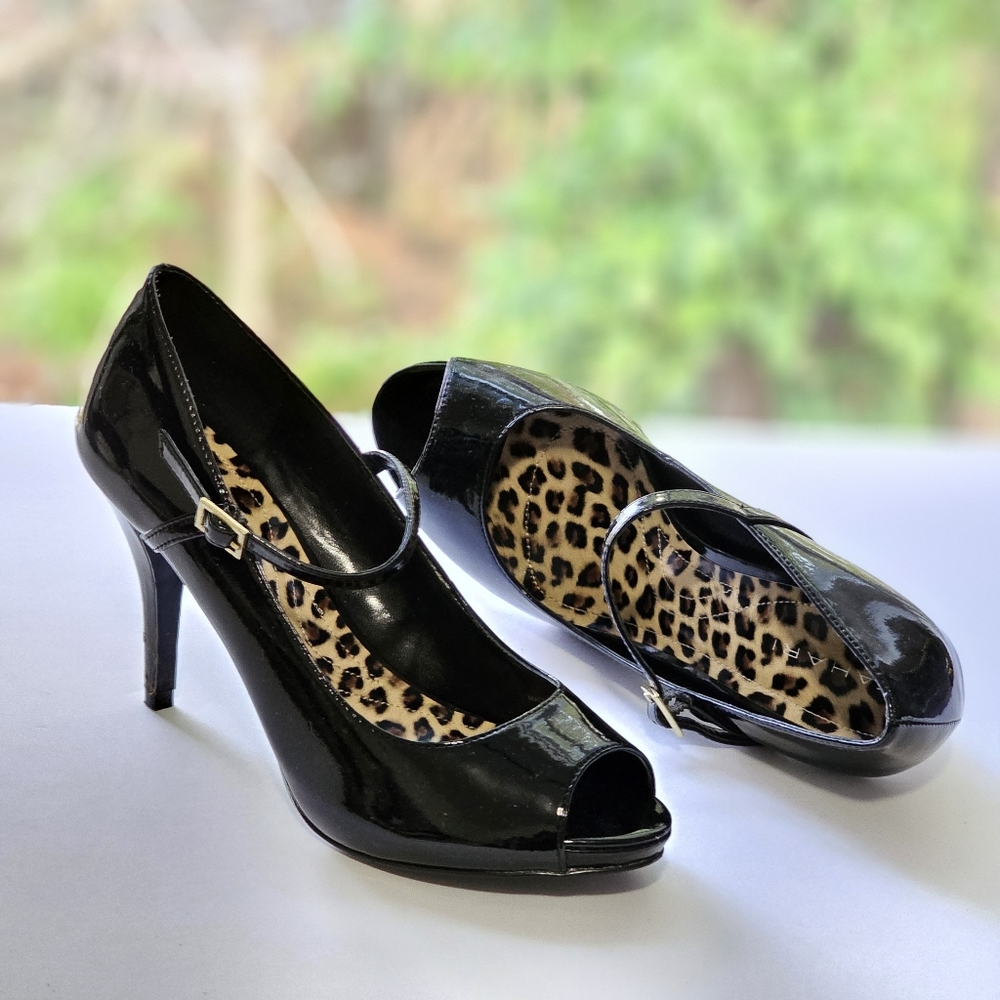 Black Tahari Peephole Stilletos with animal print insole Size 7.